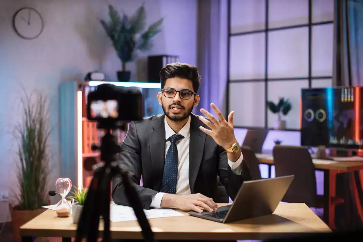 Business man sitting for live streaming